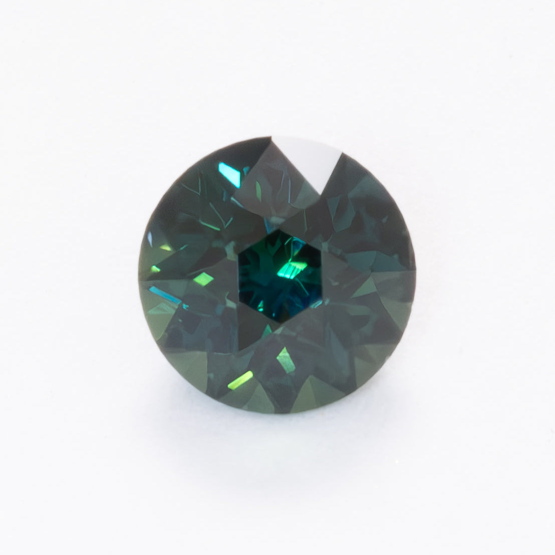 AU0124 dark teal round australian sapphire