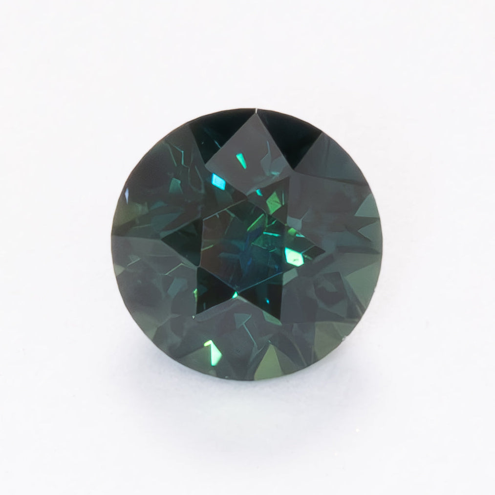 AU0124 dark teal round australian sapphire