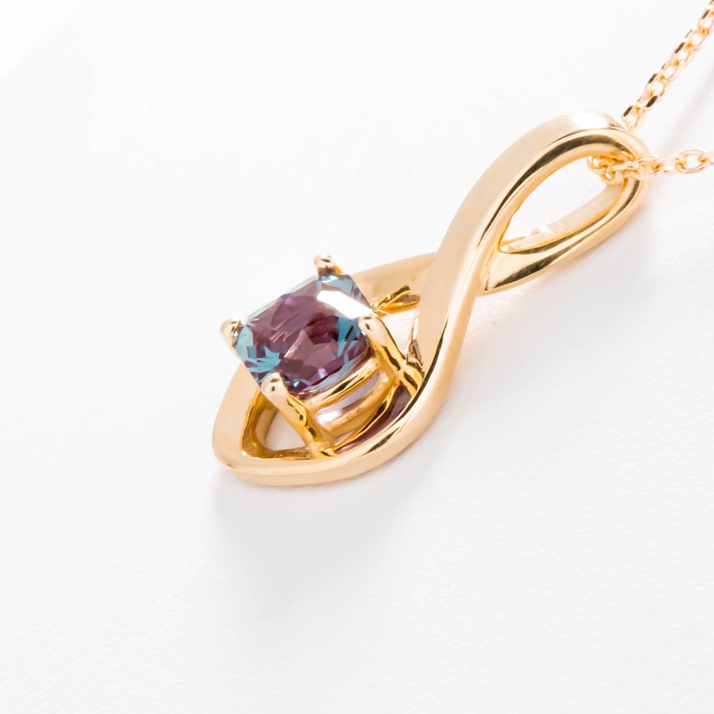 yellow gold infinity necklace with lab alexandrite asscher