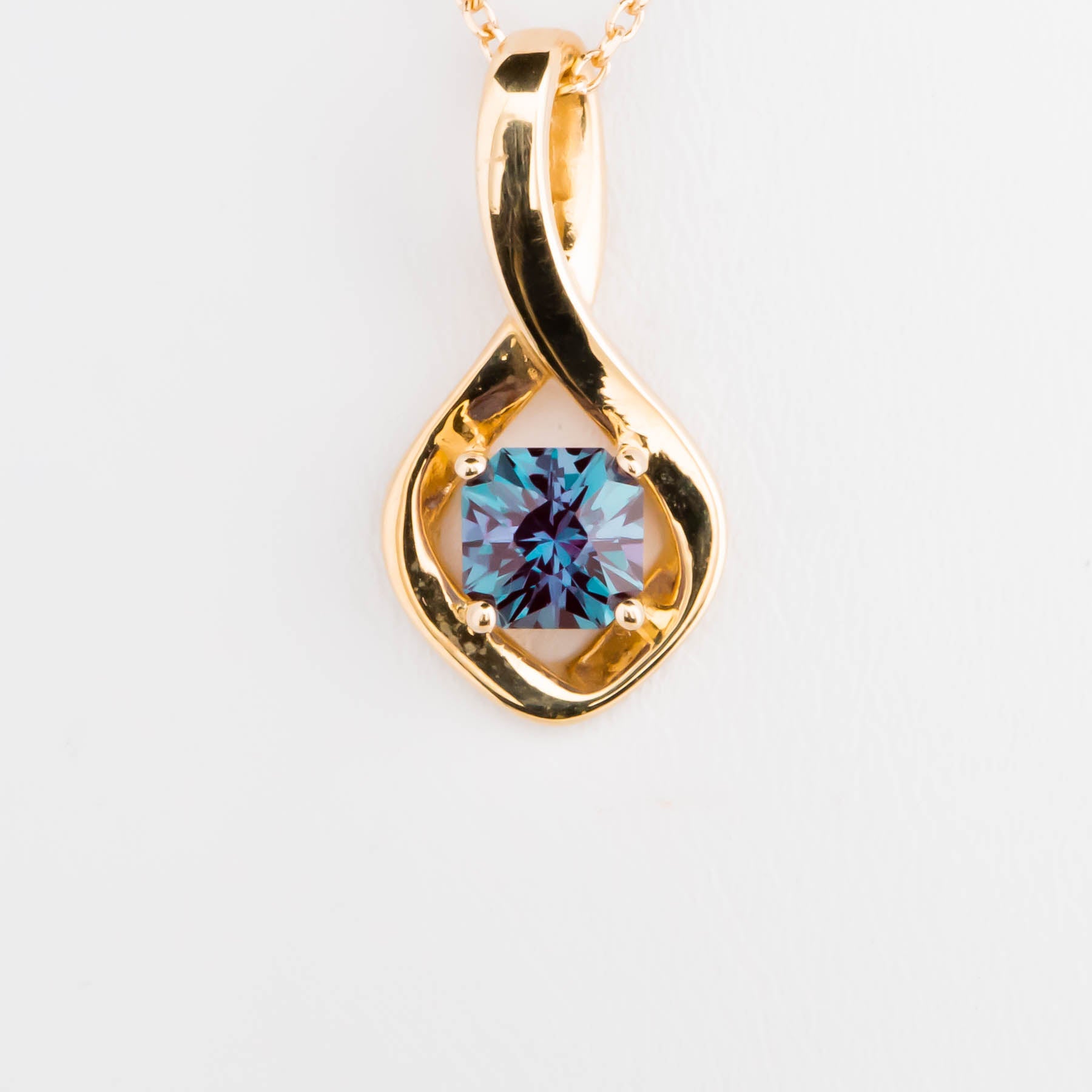 yellow gold infinity necklace with lab alexandrite asscher