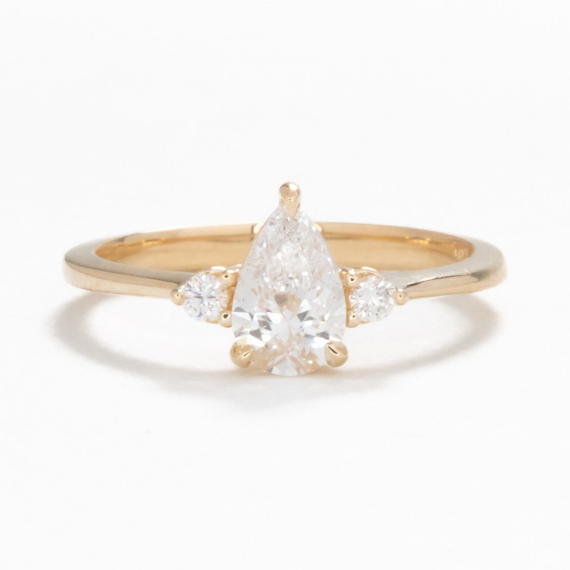 Britt engagement ring with pear lab diamond