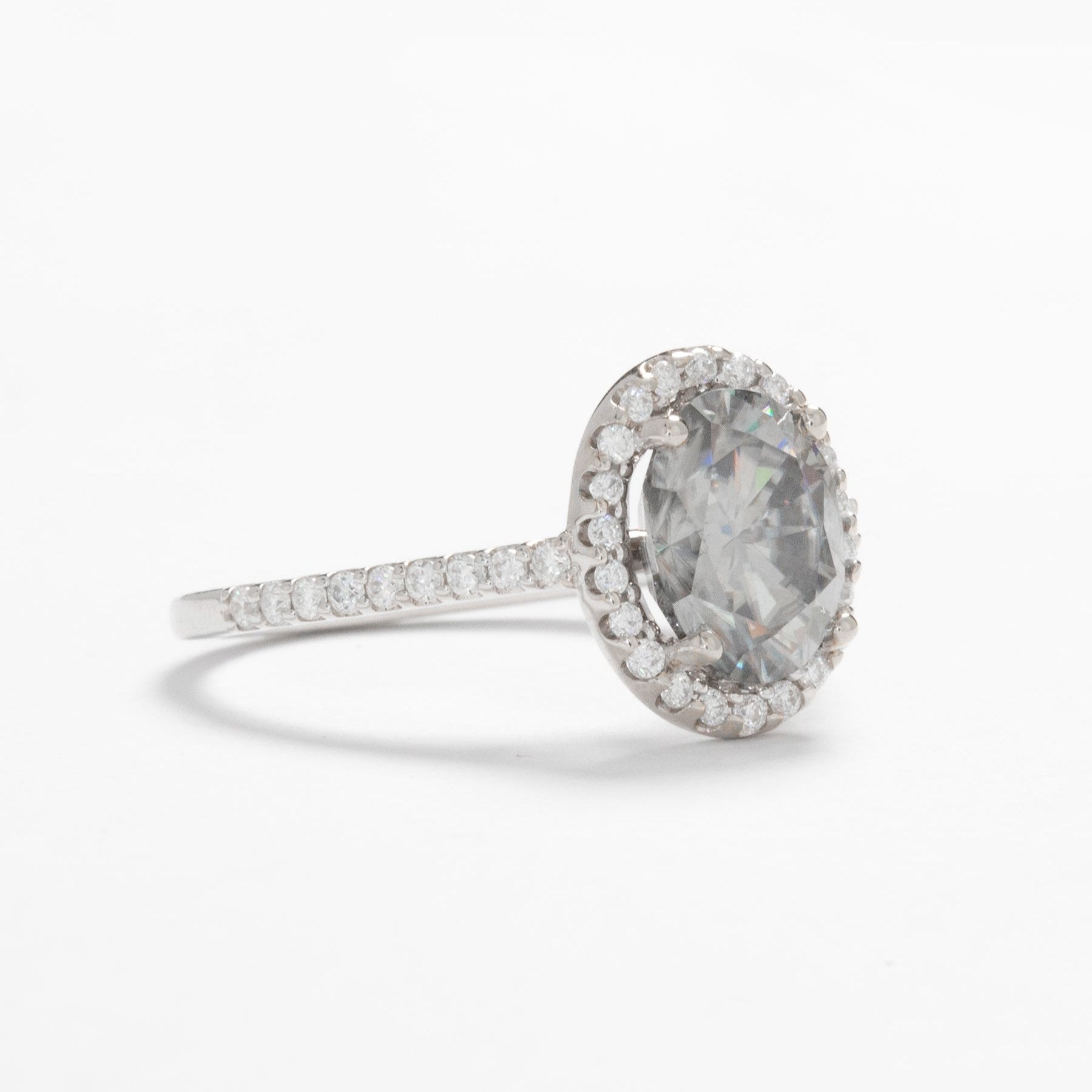 Brynn halo ring in white gold and grey oval moissanite