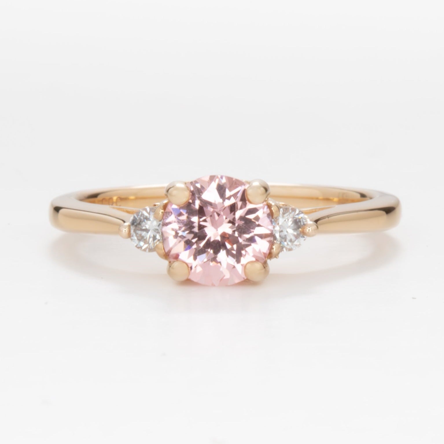 Carina ring with peach lab sapphire in yellow gold