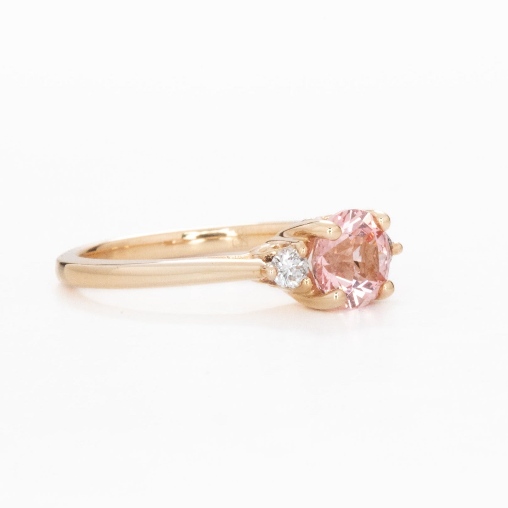 Carina ring with peach lab sapphire in yellow gold