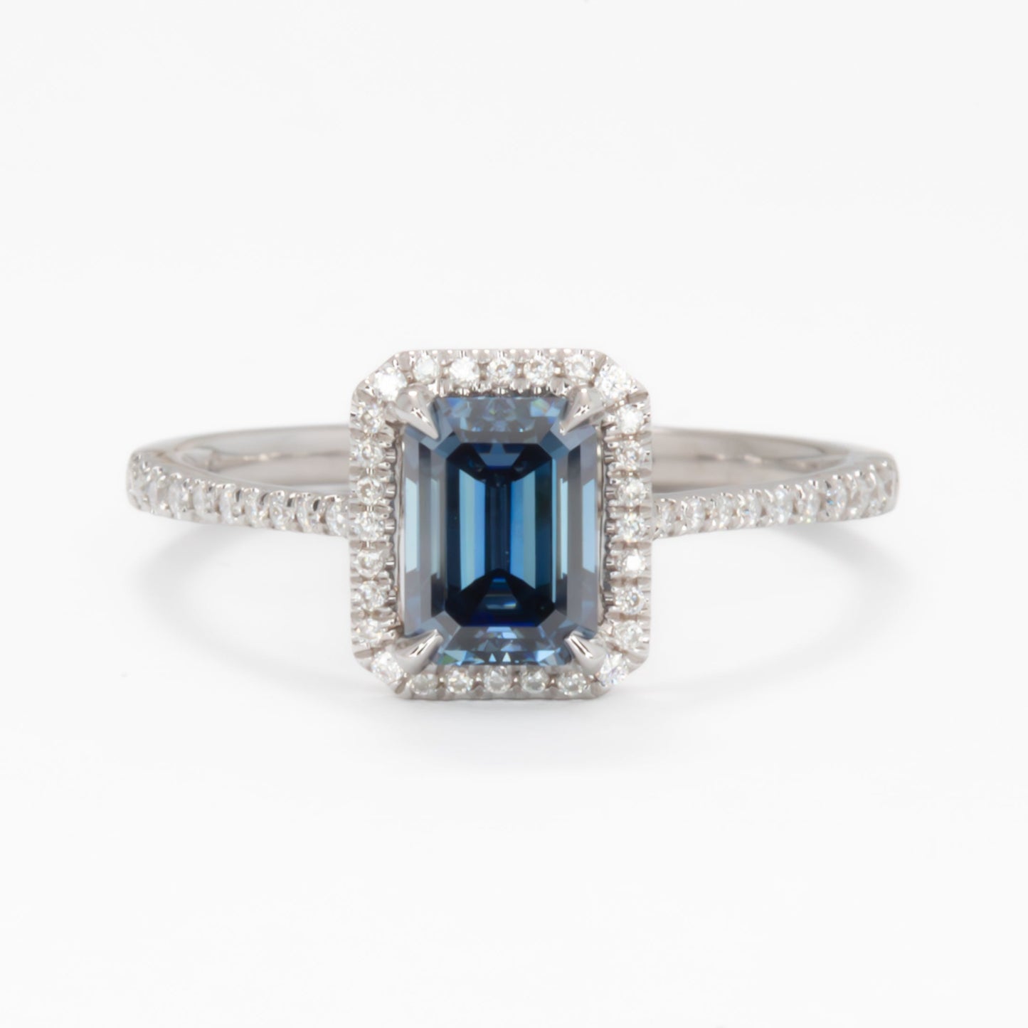 Cori engagement ring with emerald cut blue moissanite