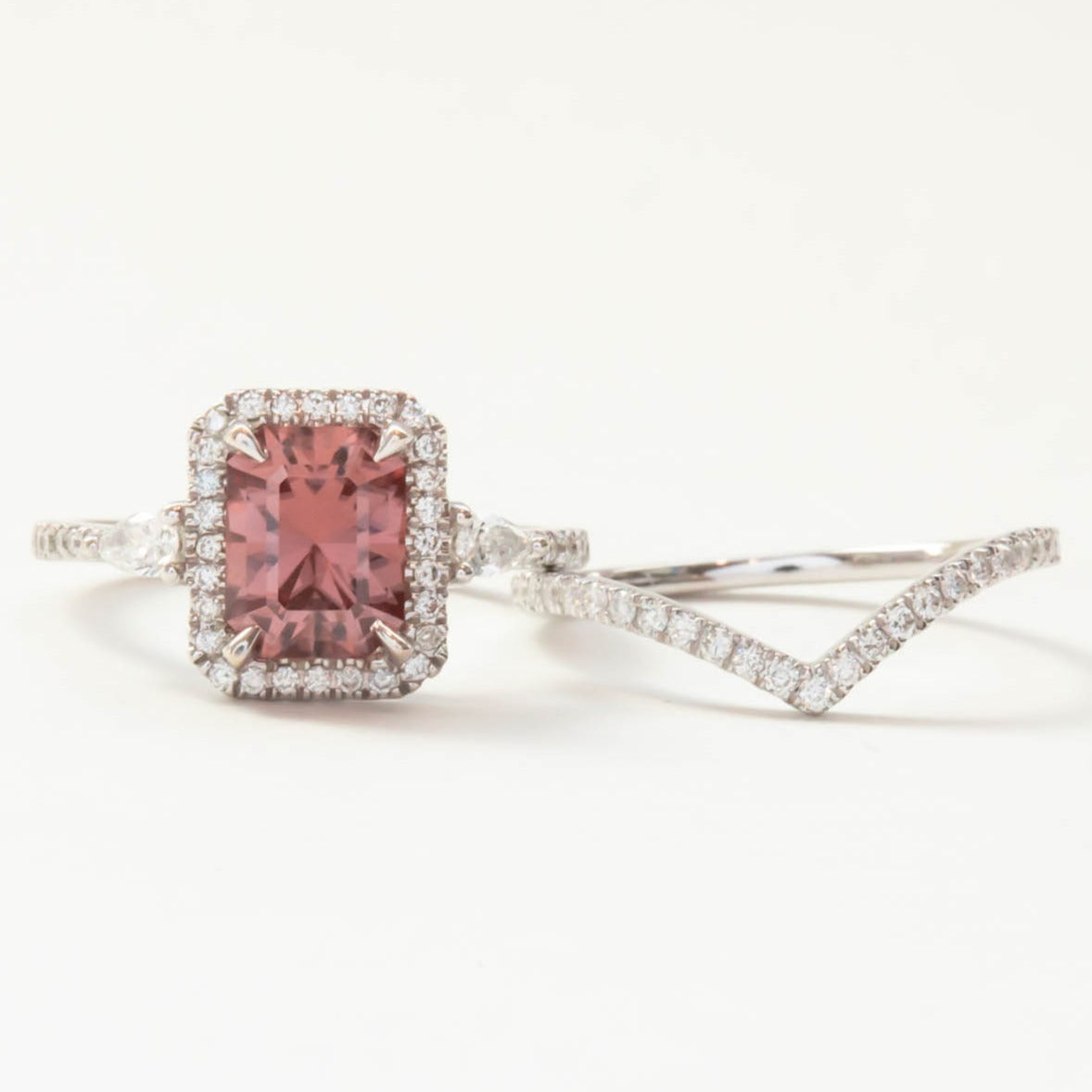 Dawn halo three stone engagement ring with pink zircon and lab diamonds