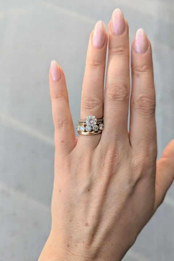 yellow gold stacking bands with round moissanitess