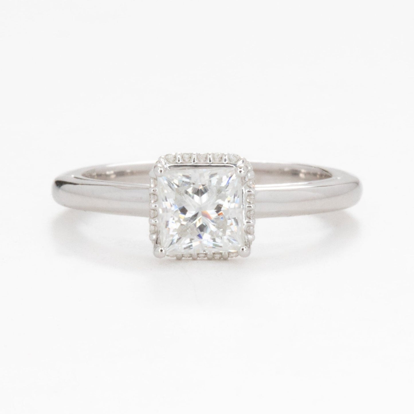 Juni engagement ring with hidden halo and princess moissanite