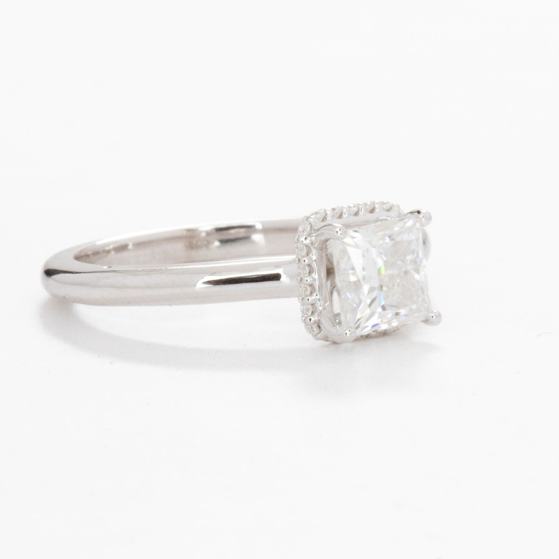 Juni engagement ring with hidden halo and princess moissanite