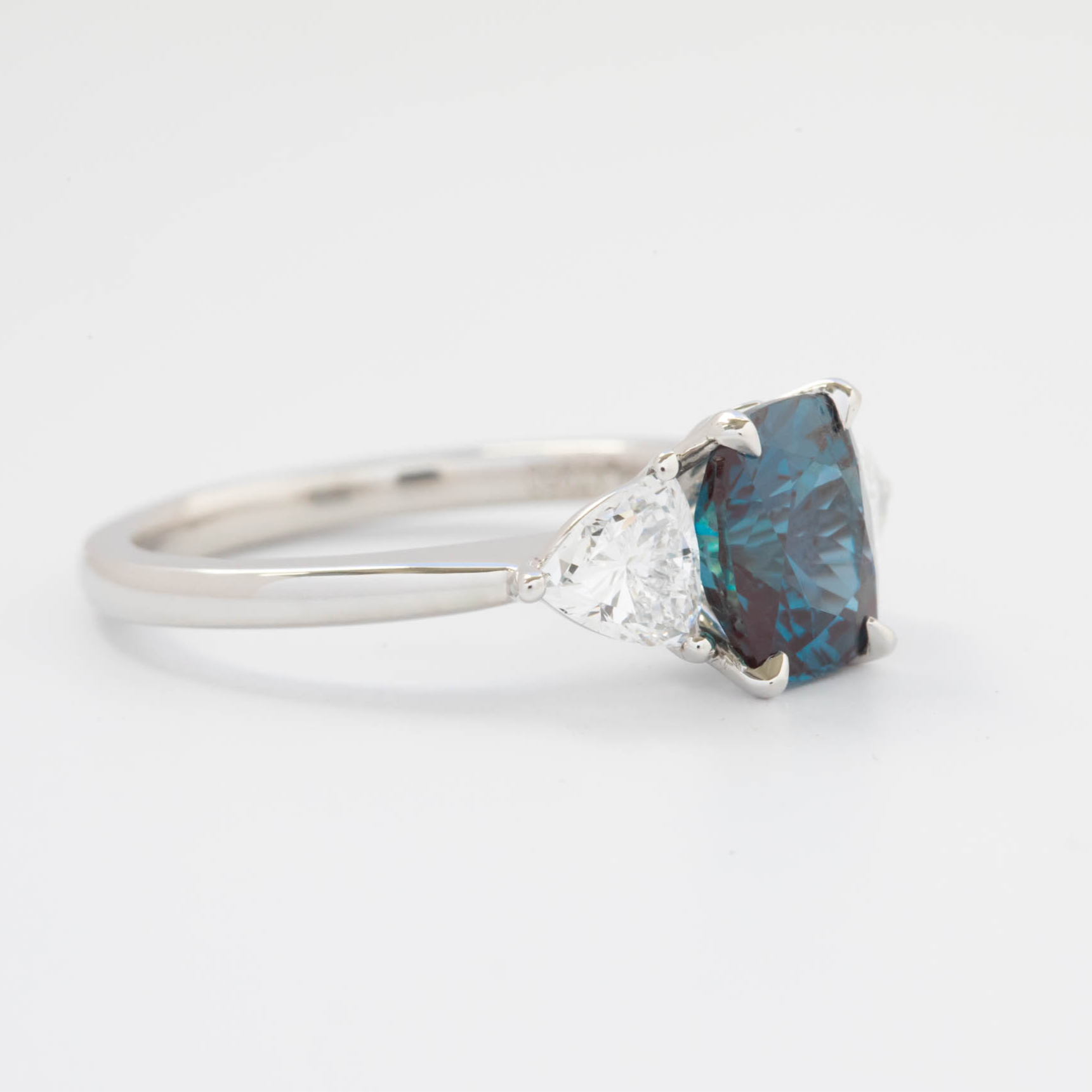 Maeve engagement ring with trillion lab diamonds and cushion alexandrite