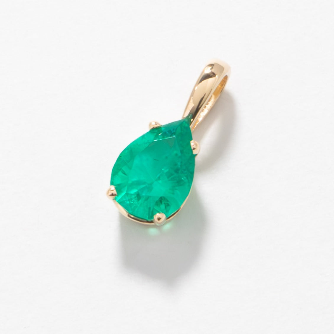 Marley Pear Pendant in Yellow Gold with a lab emerald