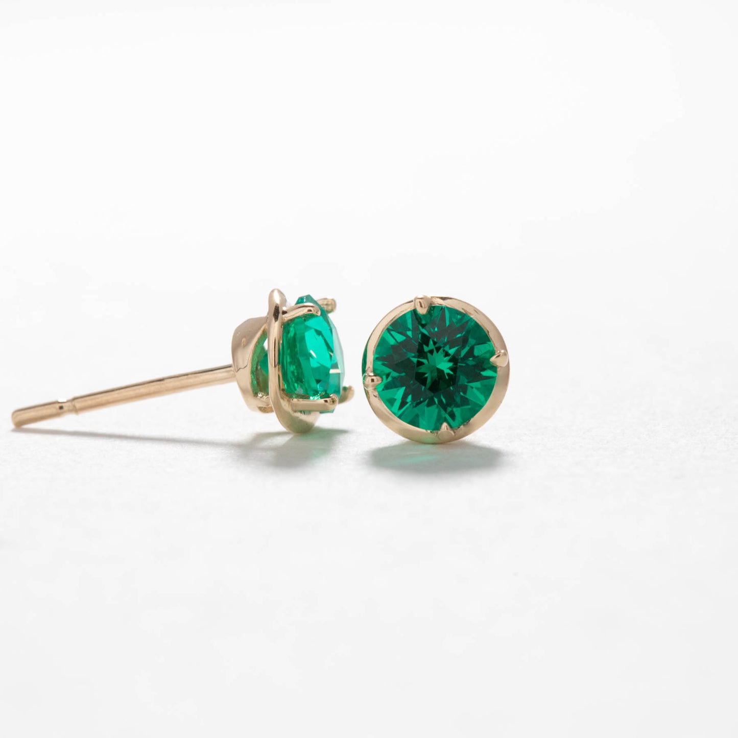 Noelle earrings in yellow gold with hydro emeralds