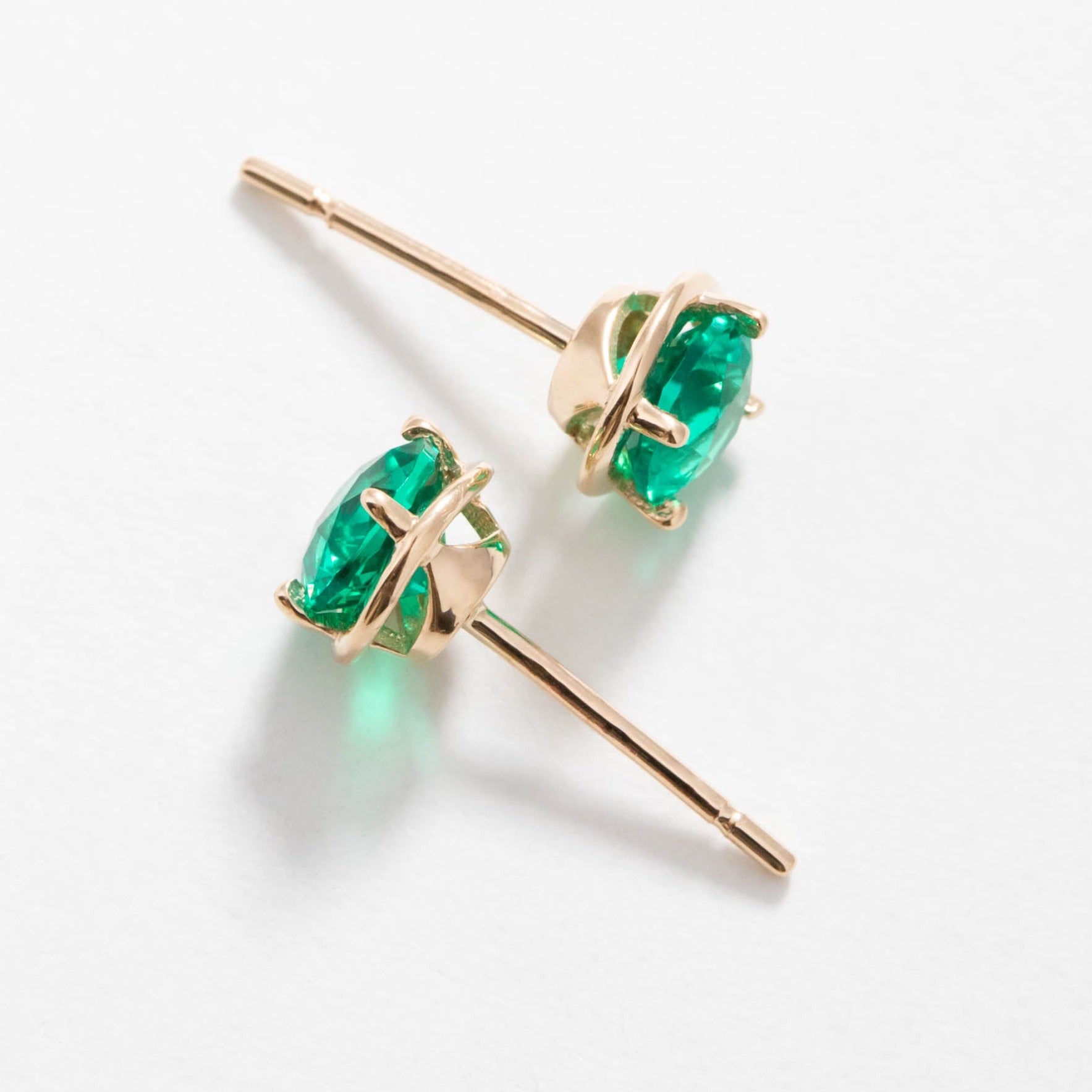 Noelle earrings in yellow gold with hydro emeralds