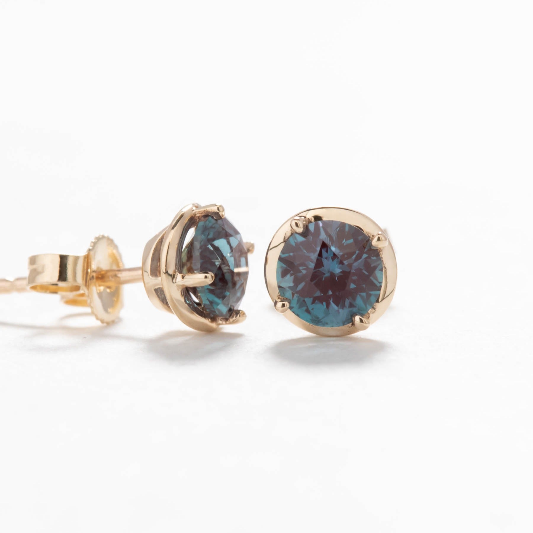 lab alexandrite and yellow gold earrings