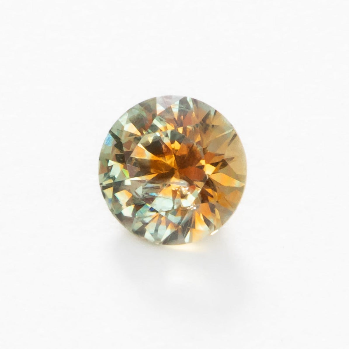 PSH0524 orange yellow round brilliant montana sapphire