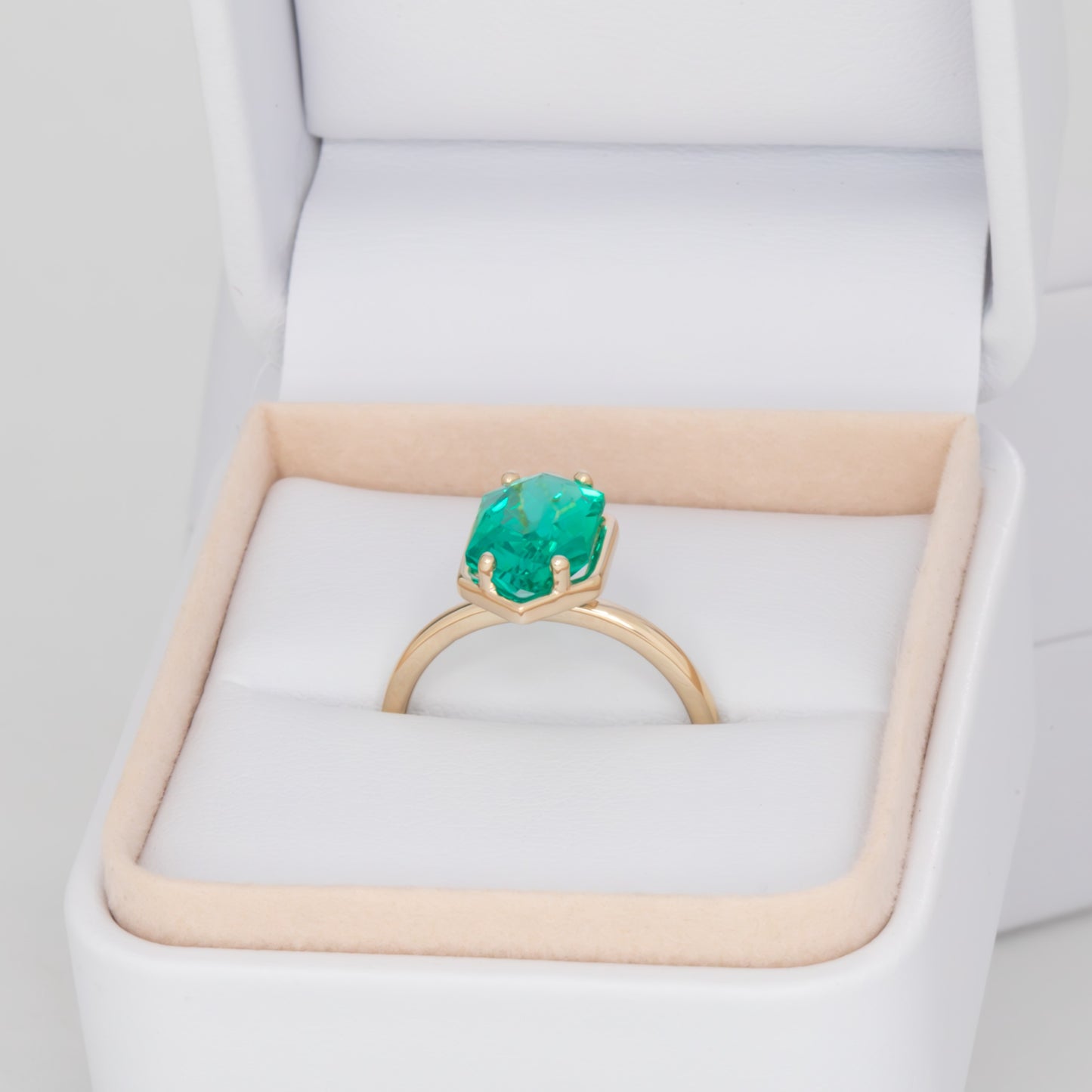 Paris solitaire engagement ring with dutch marquise lab emerald