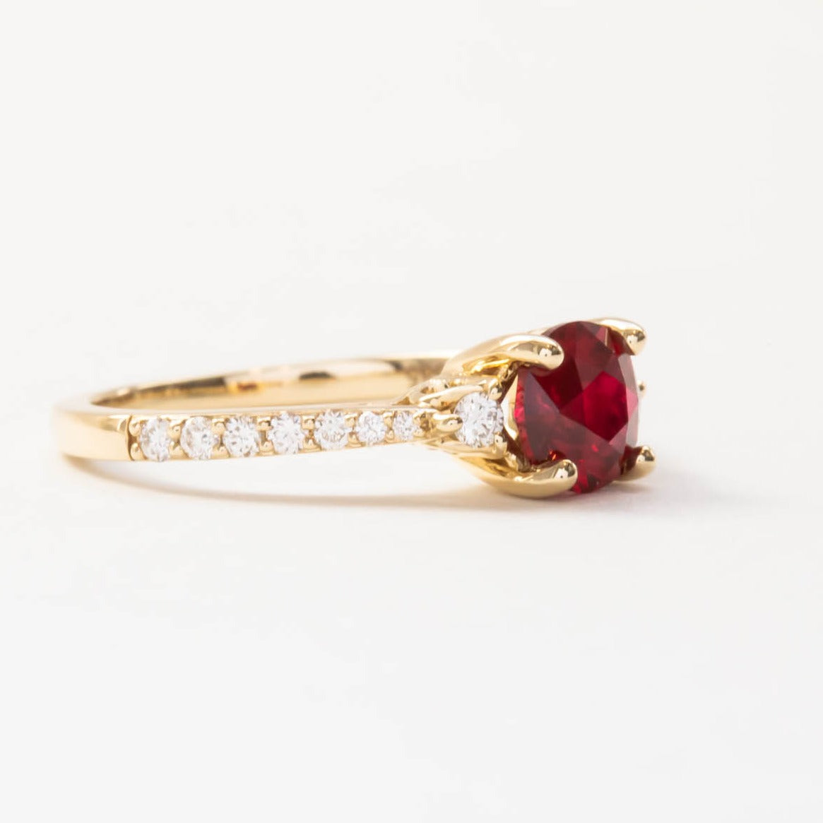 Stacy three stone engagement ring with lab ruby