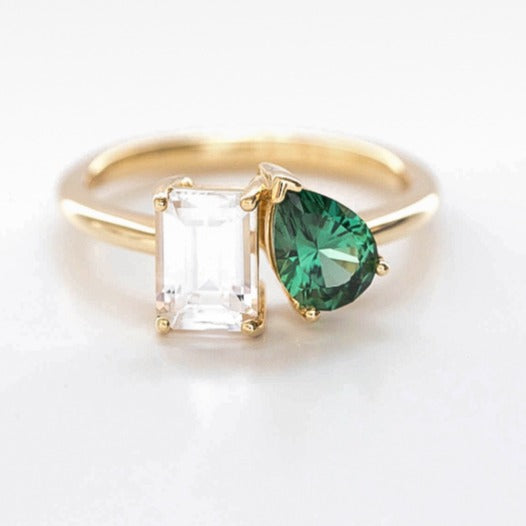 Toi et Moi ring with lab sapphires white and green