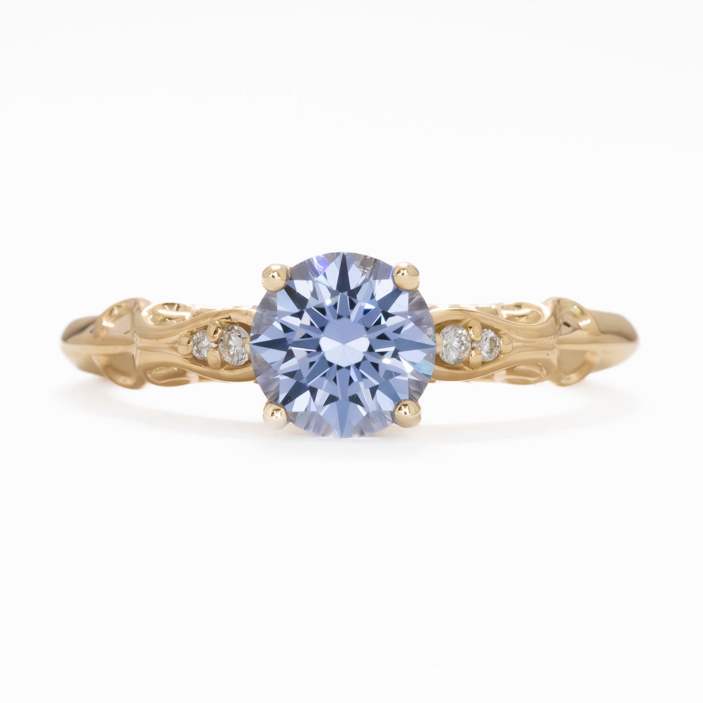 Victoria floral inspired engagement ring with blue lab sapphire