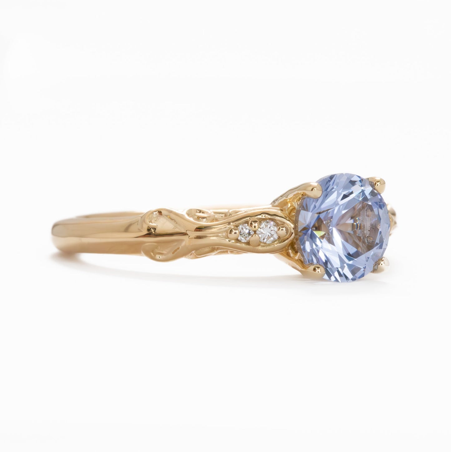 Victoria floral inspired engagement ring with blue lab sapphire