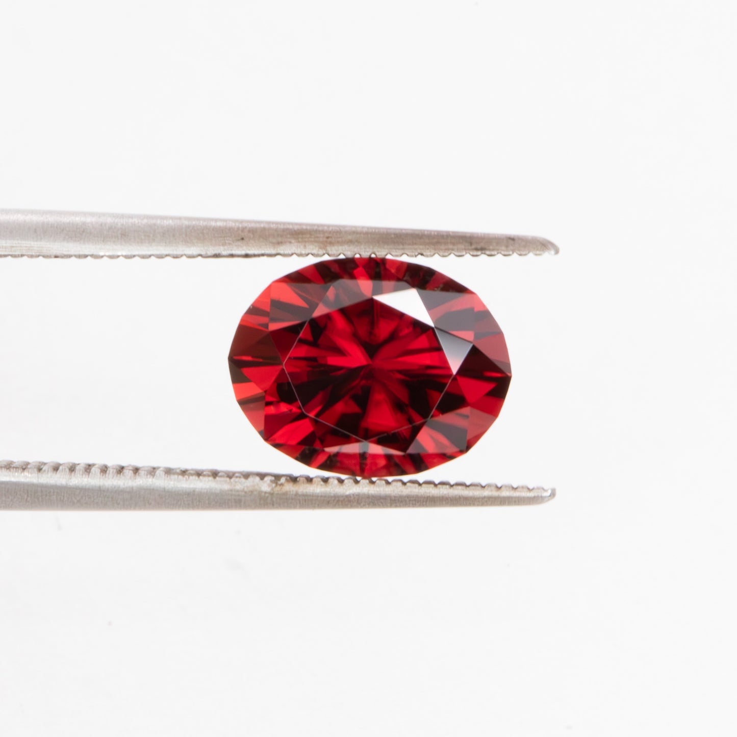 ZR130 red zircon oval