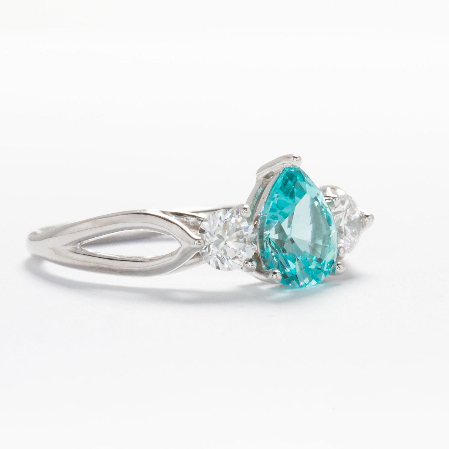 annabelle three stone ring with blue lab yag pear