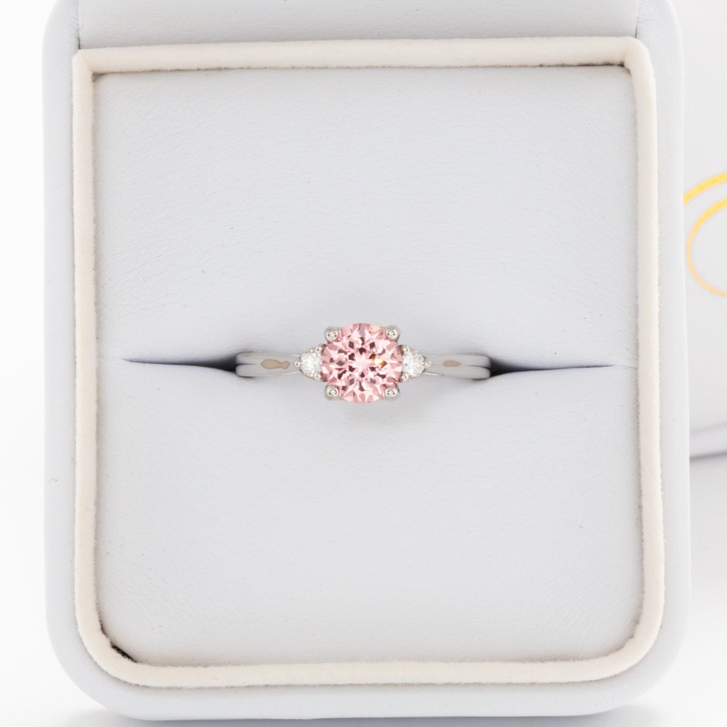 carina engagement ring with pink lab sapphire