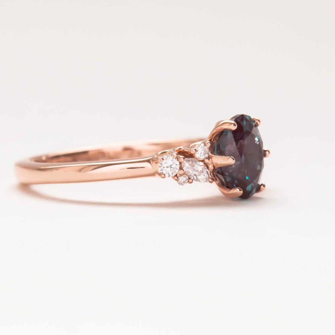 floral inspired ring with oval lab alexandrite in rose gold