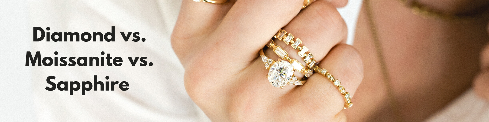 lab sapphire engagement ring and stacking bands in yellow gold