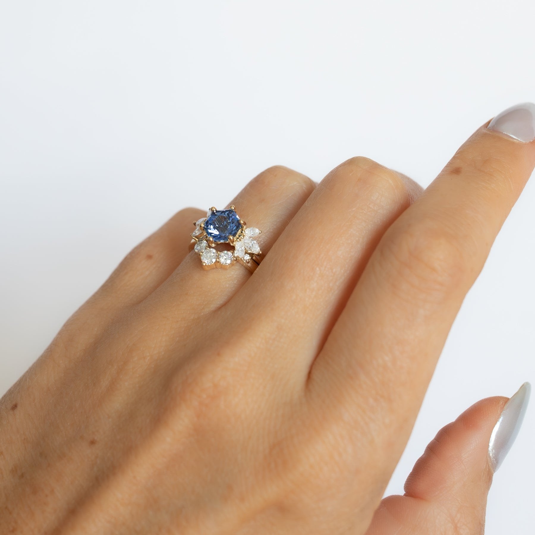 enya engagement ring with blue lab sapphire and stella wedding band
