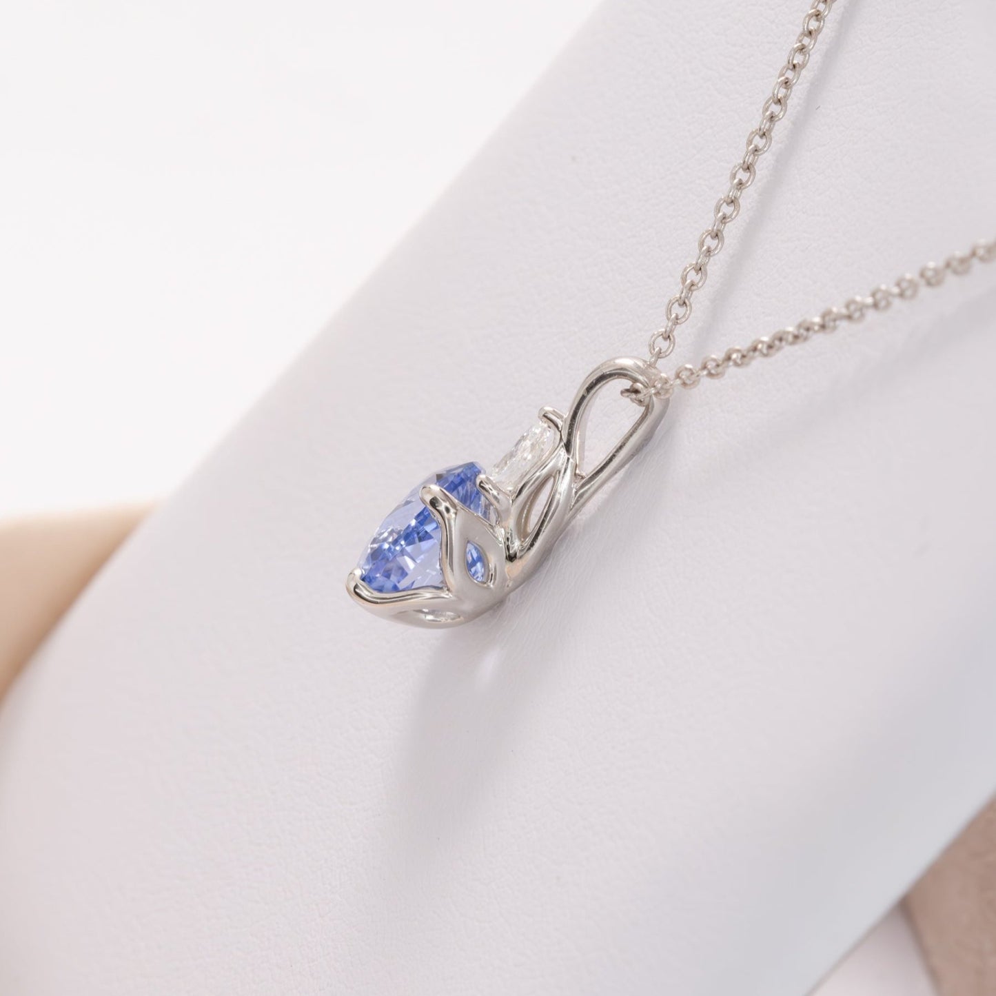 esther necklace in white gold with blue oval lab sapphire