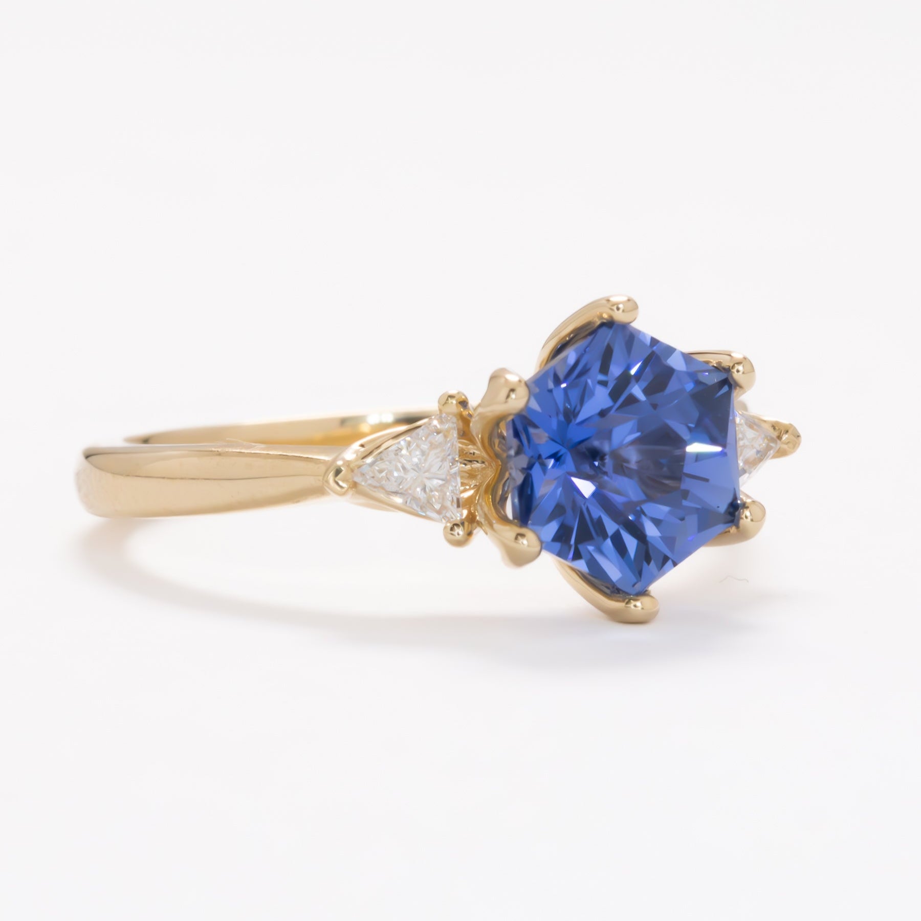 royal blue lab sapphire hex three stone ring