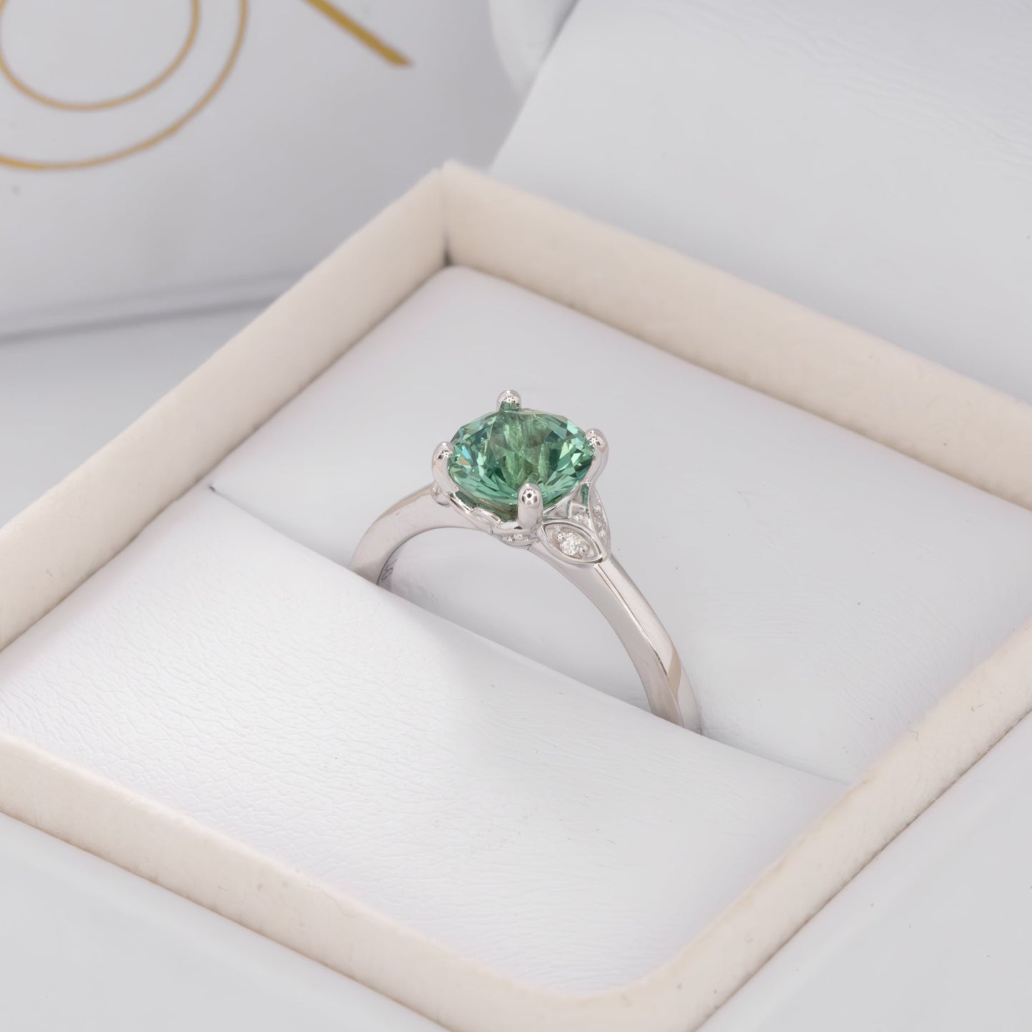 green lab sapphire round floral inspired engagement ring