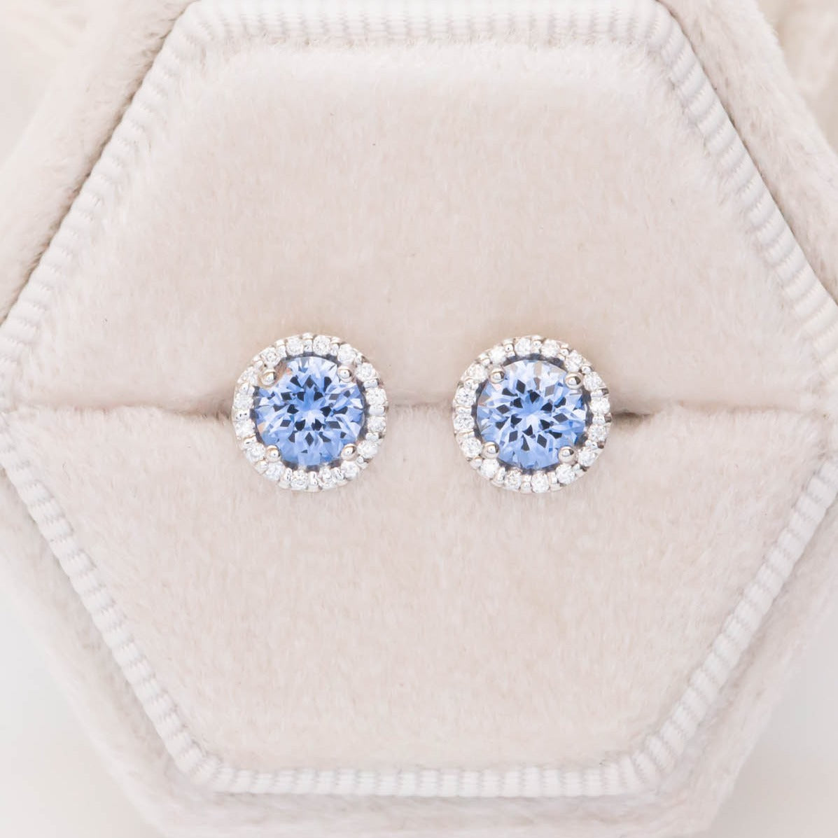 blue lab sapphire and lab diamond halo earrings