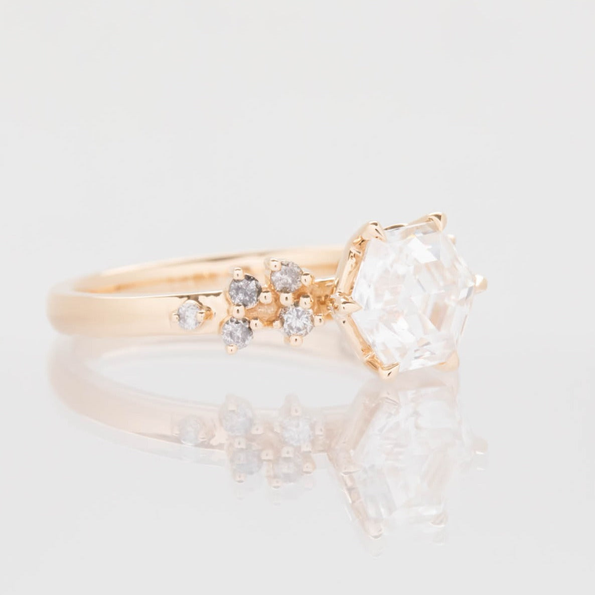 yellow gold ring with step cut hex moissanite