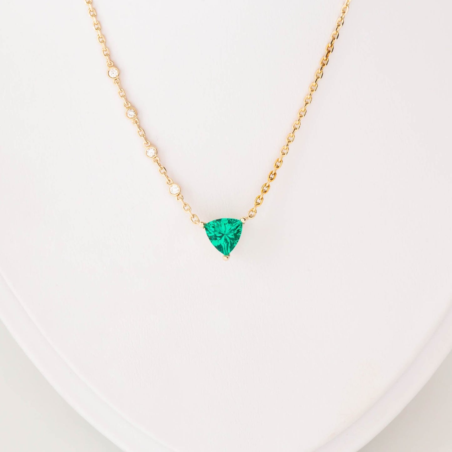 ivy necklace with trillion lab emerald