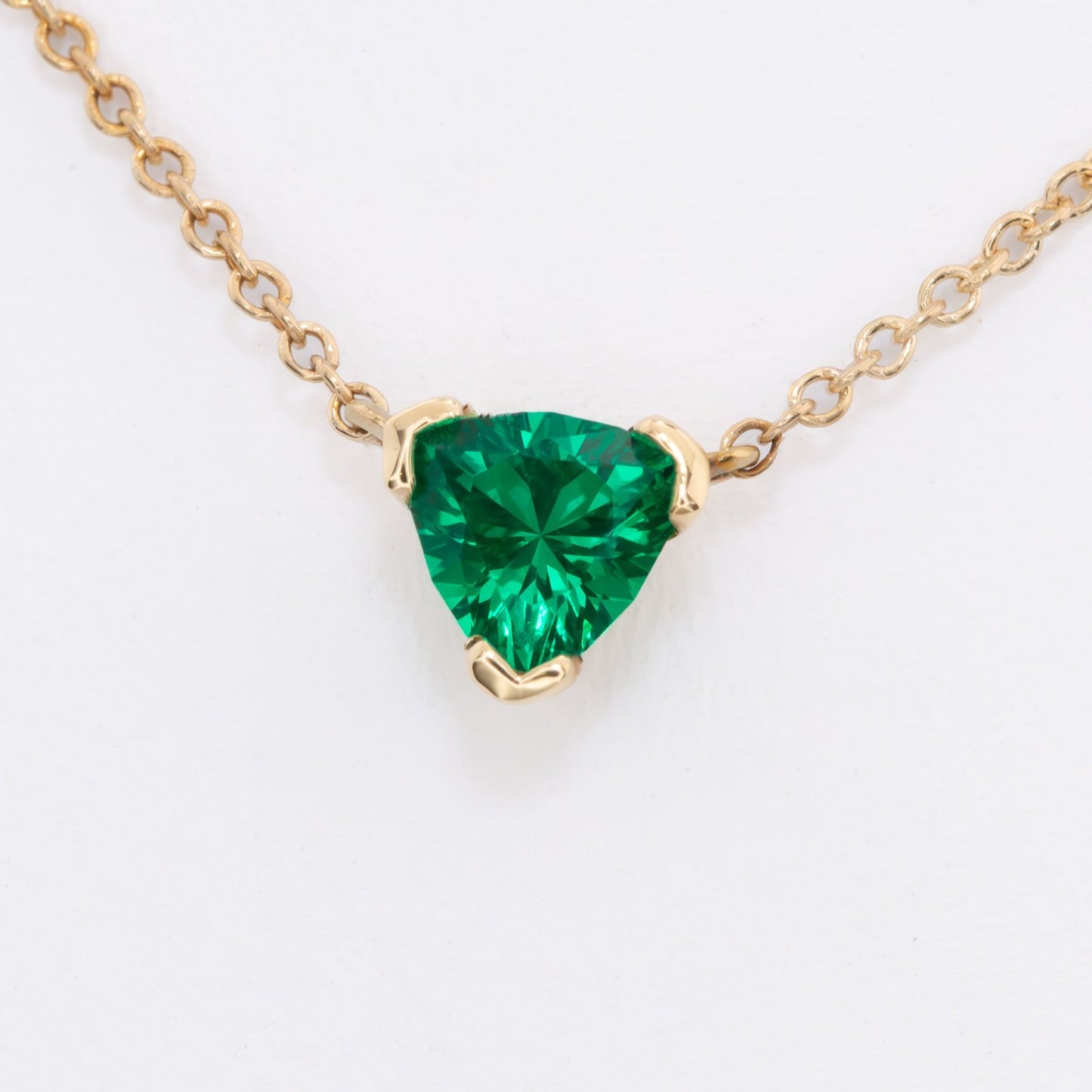 llew trillion necklace with lab emerald