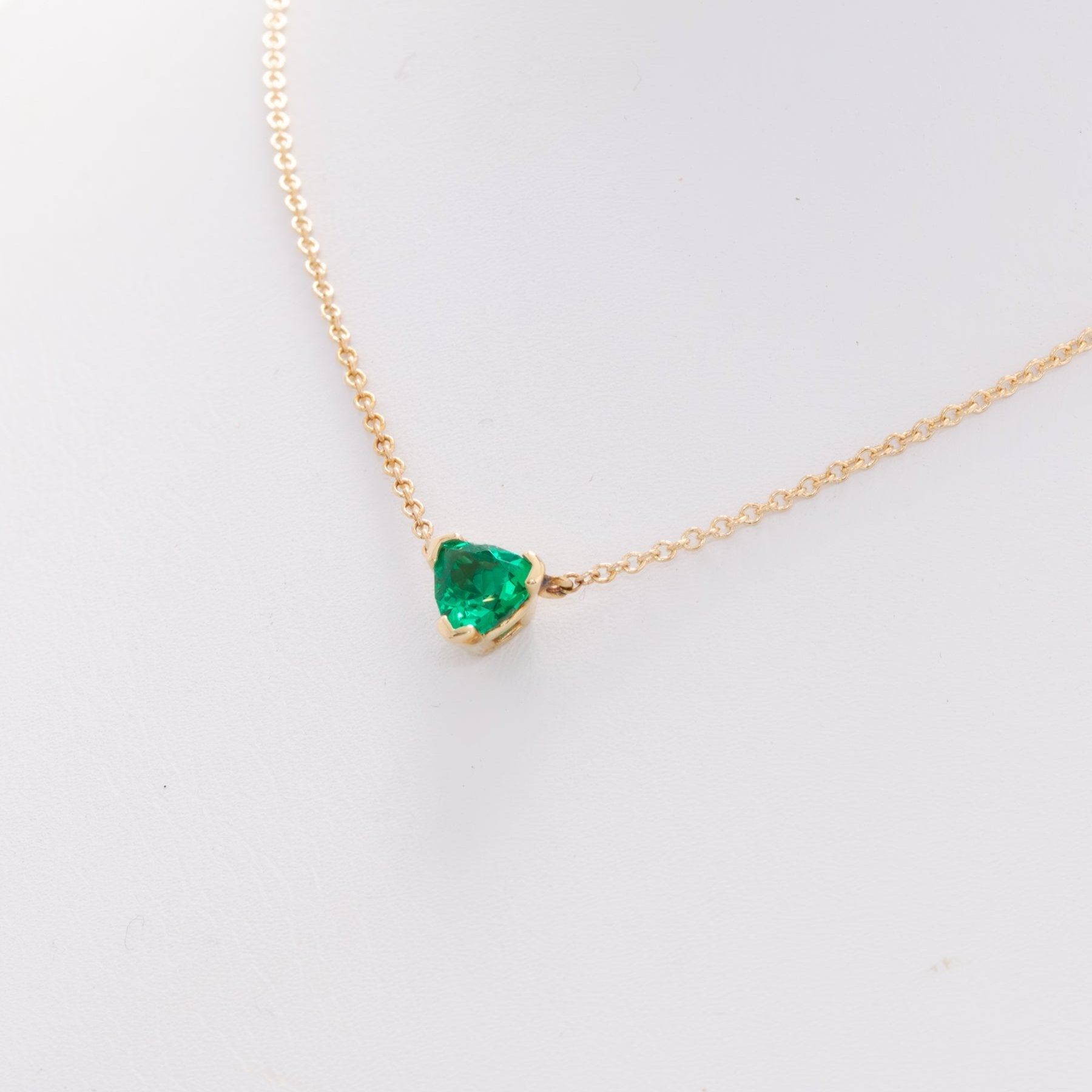 llew trillion necklace with lab emerald