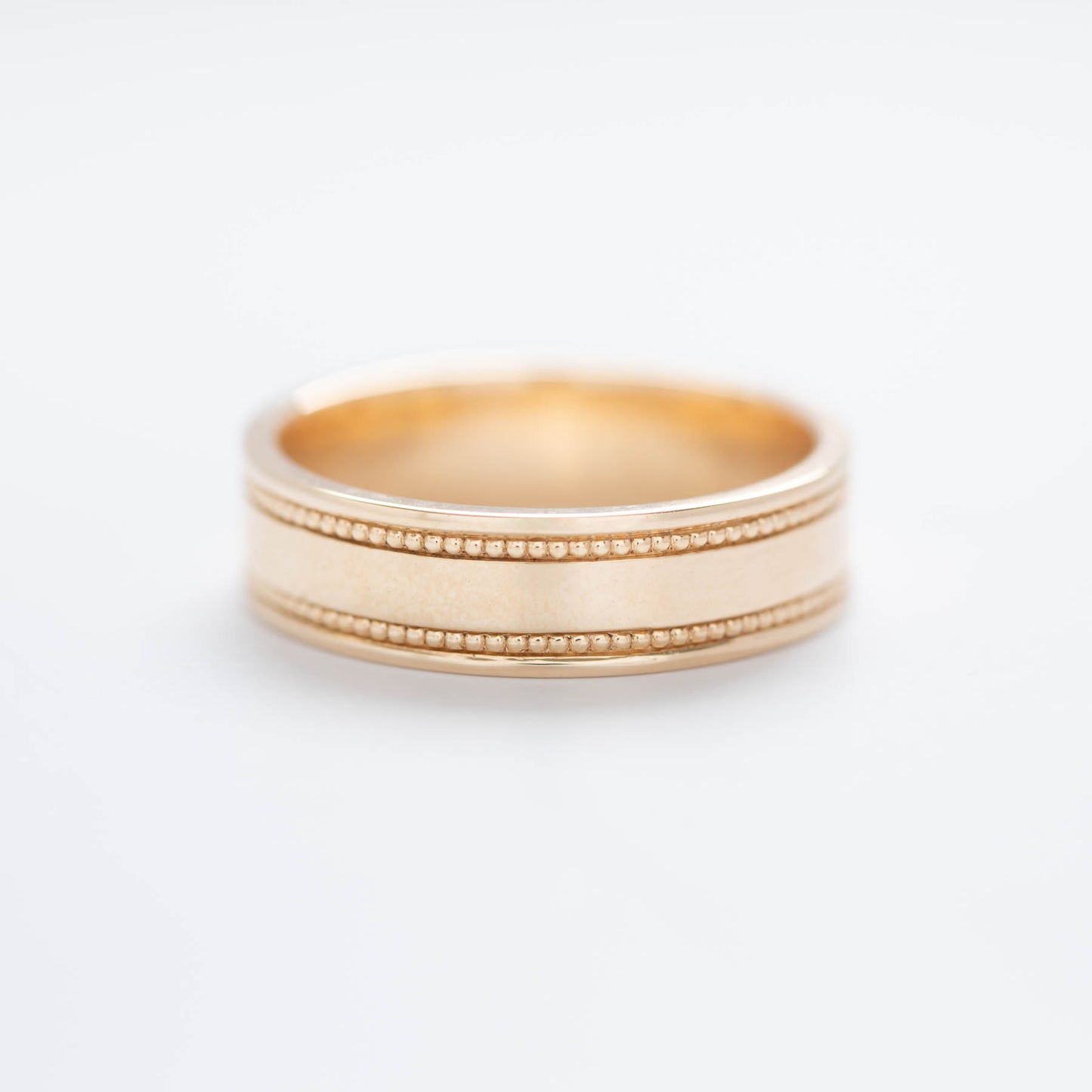 men's milgrain beaded wedding band in yellow gold