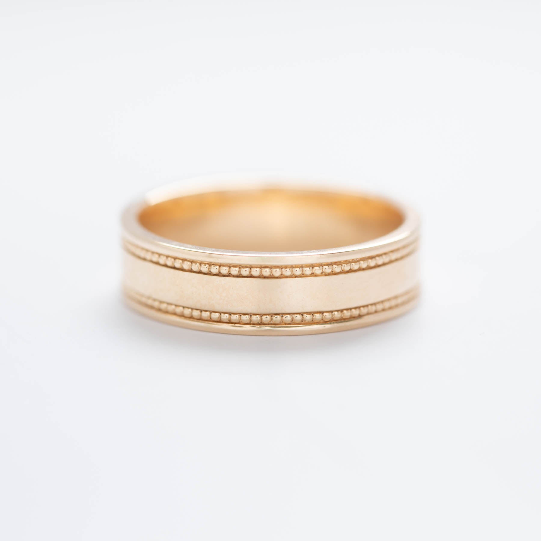 men's milgrain beaded wedding band in yellow gold