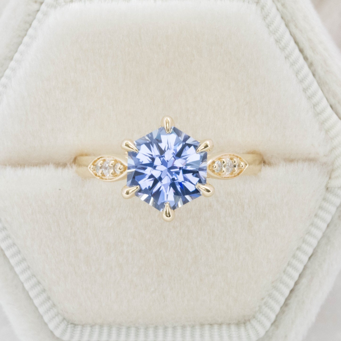 nature inspired engagement ring with hex cut blue lab ssapphire