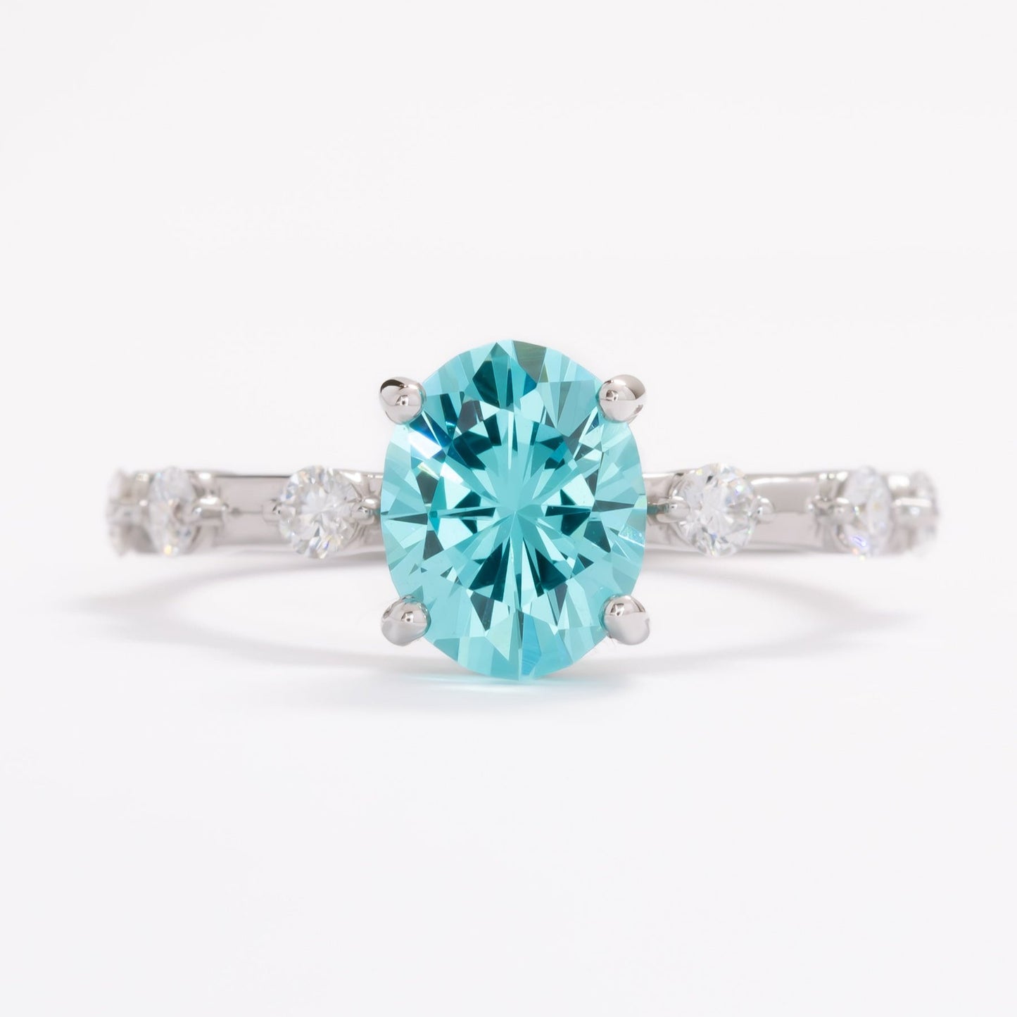 nyla engagement ring with blue-green oval yag