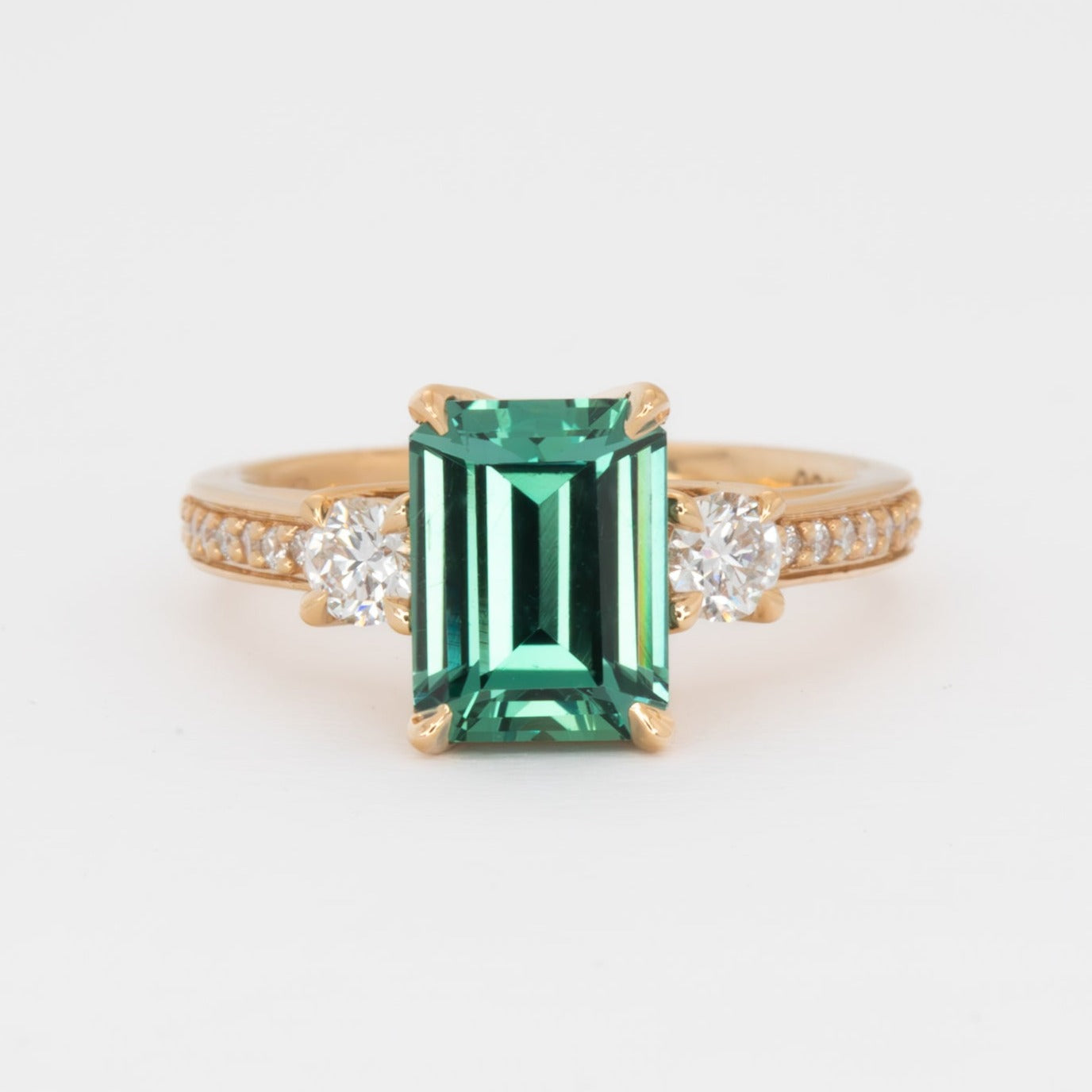 oriane engagement ring with green lab sapphire step cut