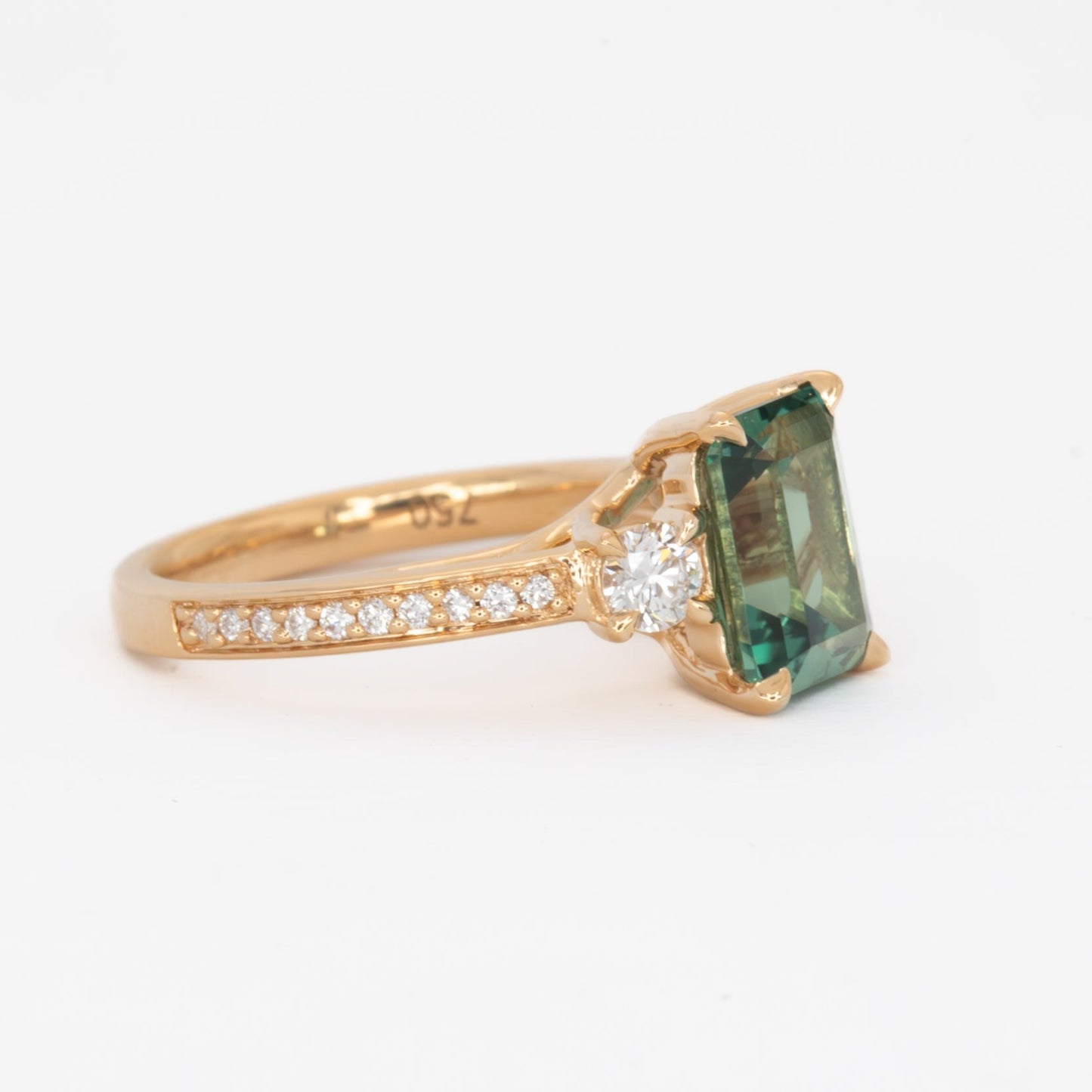 oriane engagement ring with green lab sapphire step cut