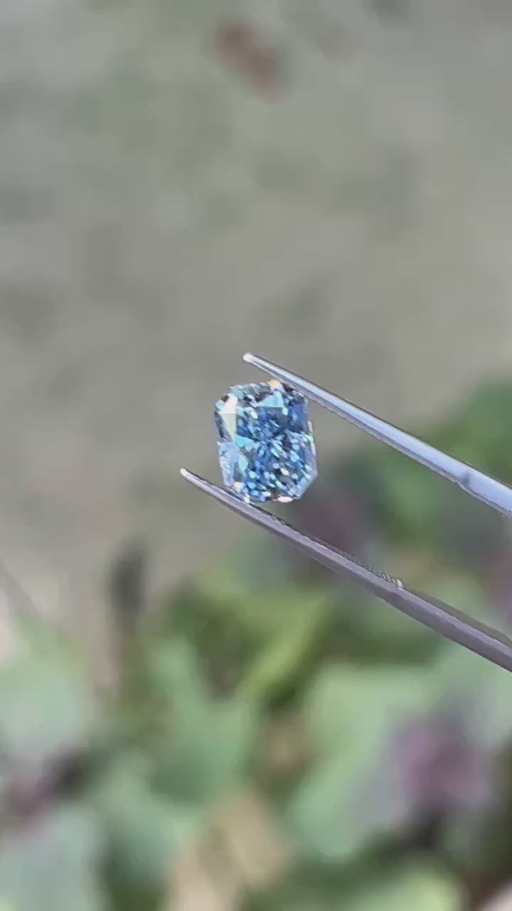 radiant blue moissanite tweezer video