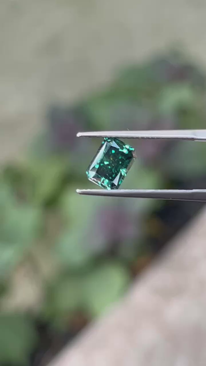 radiant green moissanite tweezer video