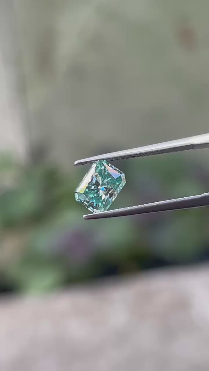 radiant blue-green moissanite tweezer video