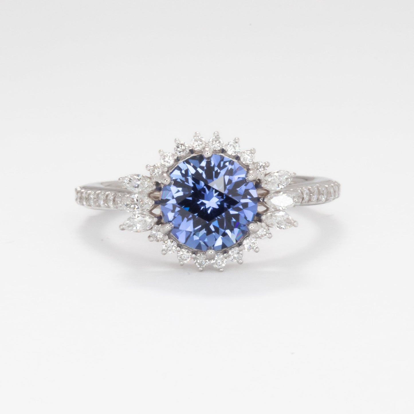 round cut blue lab sapphire halo engagement ring