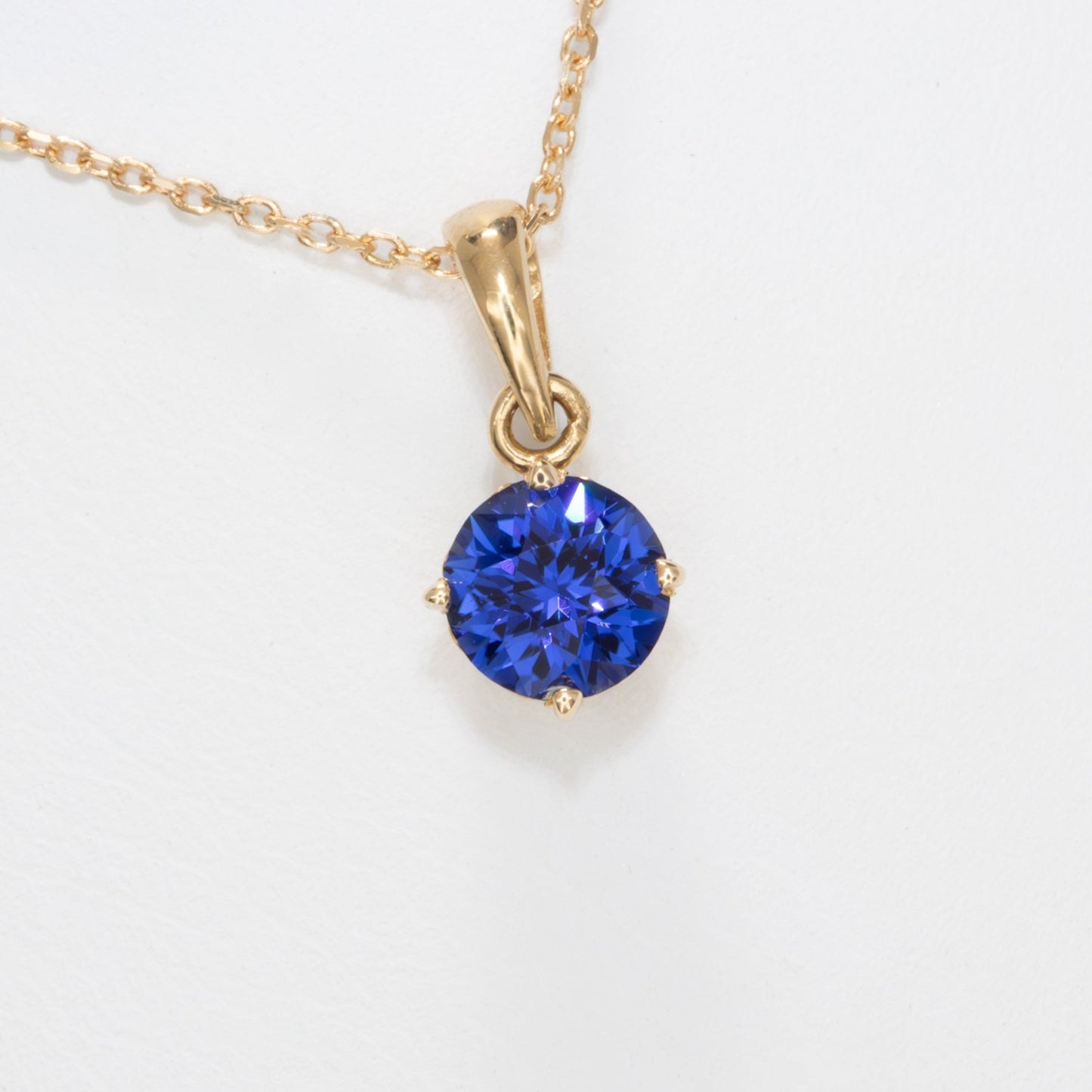 royal blue lab sapphire and yellow gold necklace