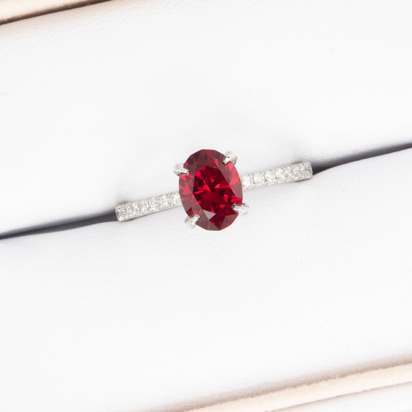 rumi engagement ring with oval lab ruby